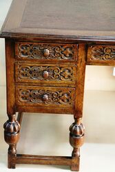 Early C20th Carved Oak 7 Drawer Writing Desk