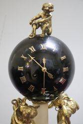 French Bell Strike Clock In Round Black Ball On top Of Cherubs 