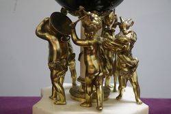 French Bell Strike Clock In Round Black Ball On top Of Cherubs 