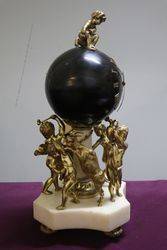 French Bell Strike Clock In Round Black Ball On top Of Cherubs 