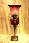 Late Victorian Ruby Glass Oil Lamp Arriving