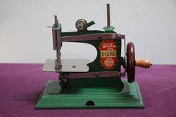 Diana playing with toy sewing machine deals