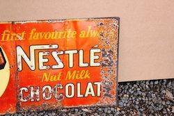 Nestle Embossed Tin Advertising Sign