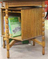 Oak Revolving Display Cabinet with Rolling Front and Back Doors