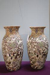 Pair Of Japanese Pottery Vases Embellished With Relief Decoration 