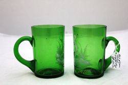 Pair Of Mary Gregory Green Glass Mugs