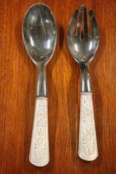 Pair Of Silver Handle Servers 