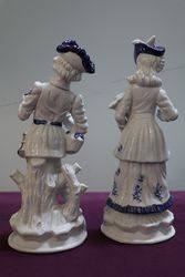 Pair of 20th Century China Figures  