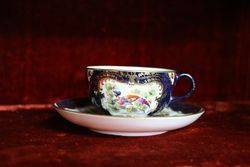 Royal  Blue   Ground Cup and Saucer Painted Exotic Birds By CJohnson C1917