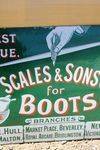 Scales and Sons Boots Enamel Advertising Sign