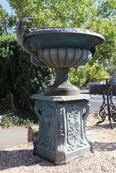 Small Sienna Cast Iron Urn On Base 