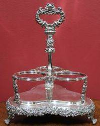 Victorian 3Bottle Tantalus on SilverPlated Stand