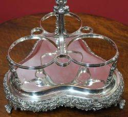 Victorian 3Bottle Tantalus on SilverPlated Stand