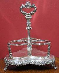 Victorian 3Bottle Tantalus on SilverPlated Stand