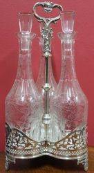 Victorian SilverPlated Tantalus with 3 Wine Decanters