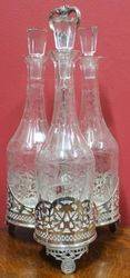 Victorian SilverPlated Tantalus with 3 Wine Decanters