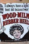 Wood Milne Rubber Heels Enamel Sign